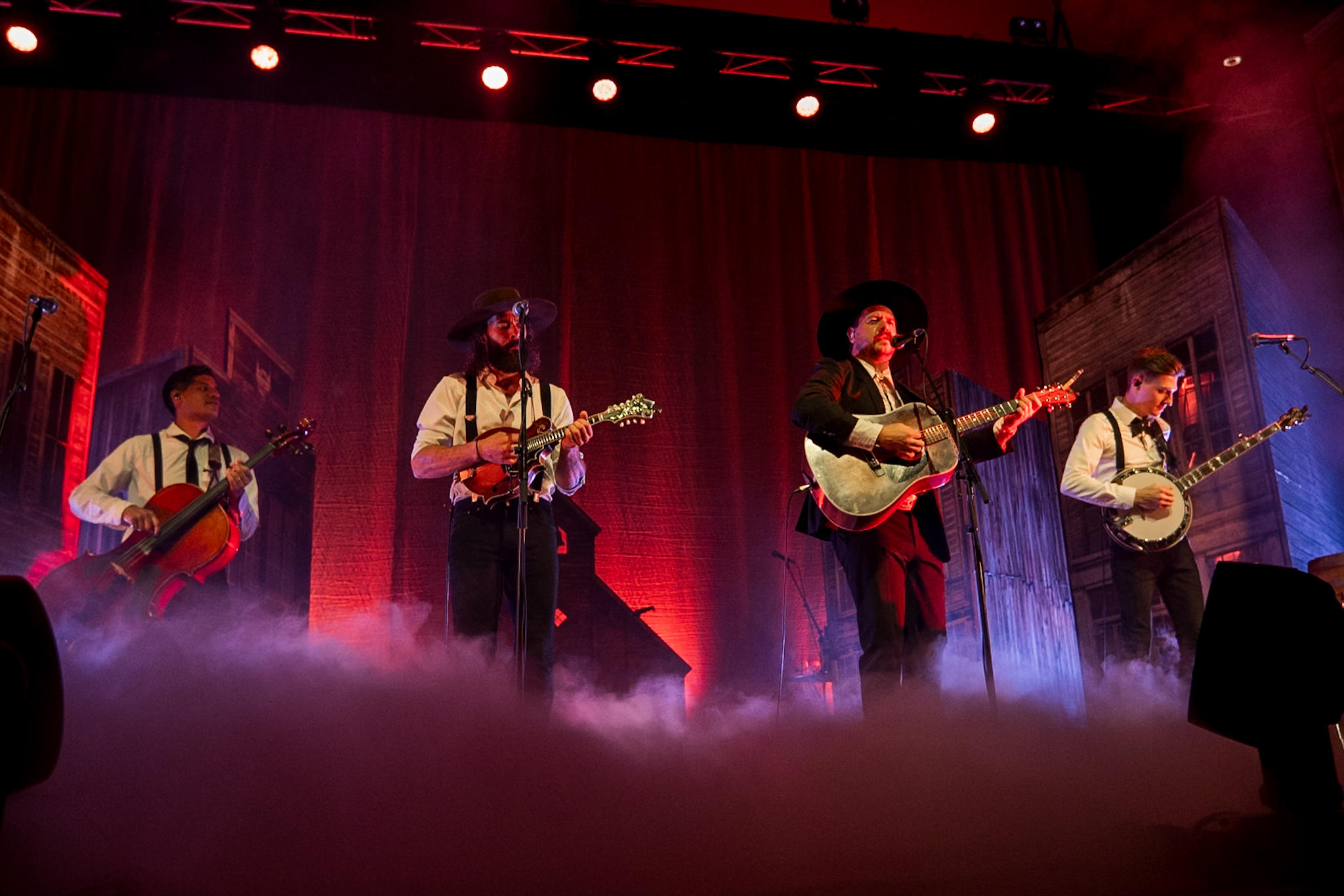 The full band performing on stage