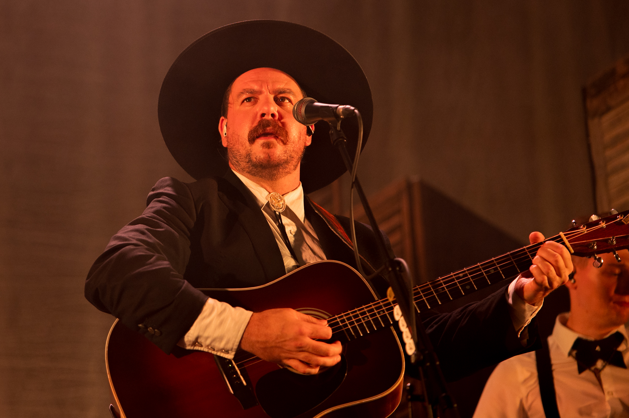 Nate Hilts singing and playing guitar